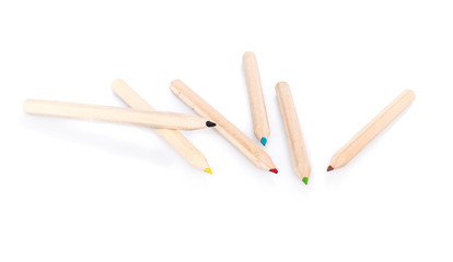 Various color pencils on white background