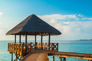 Over water bungalows with steps into amazing green lagoon