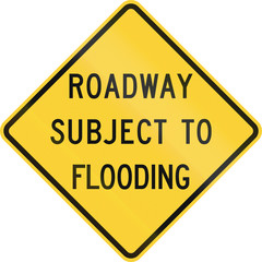 US road warning sign: Roadway subject to flooding