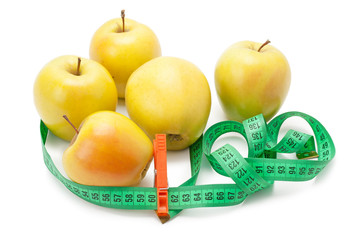 apples tape measure and clothespin