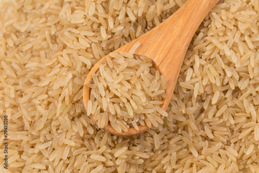 Wall mural uncooked brown rice background