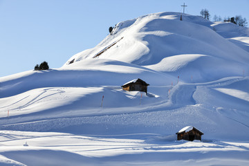 A mountain hut in winterly alpine scenery