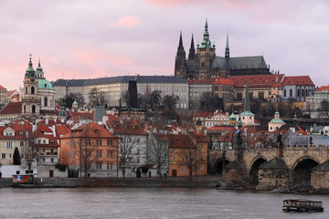 Prague gothic Castle with Charles Bridge after sunset