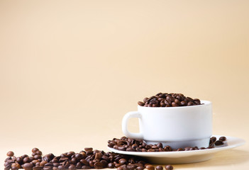 Cup from coffee on  grains