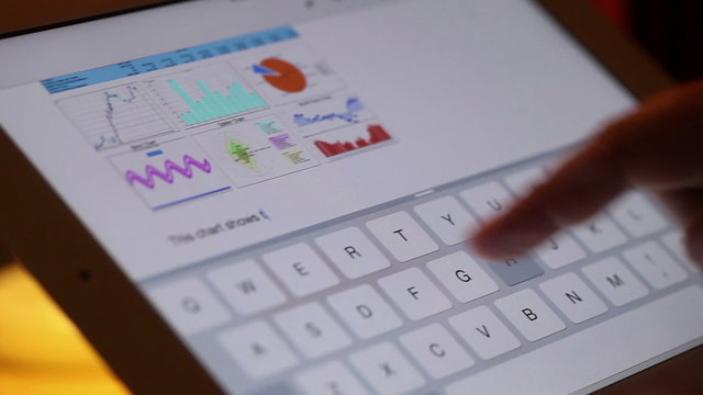 Closeup of fingers taking notes