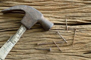 old tools on wooden background, hammer