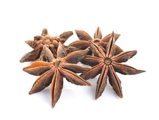 Star anise spice fruits and seeds isolated on white background
