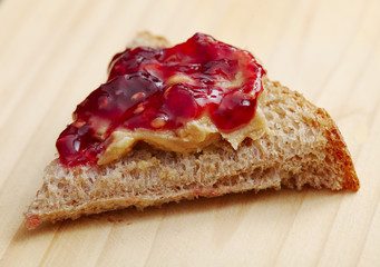 Bread with peanut butter and raspberry jelly