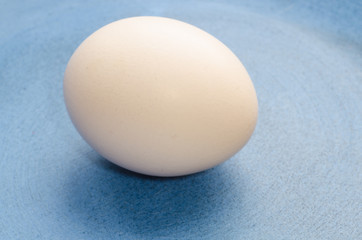 egg on blue plate