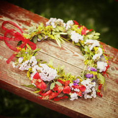 Flower wreath decoration on wood