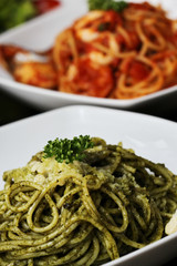 Fresh spaghetti with tomato sauce close up