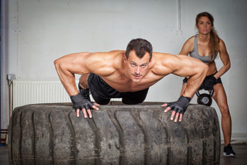 Push up on a tire crossfit training