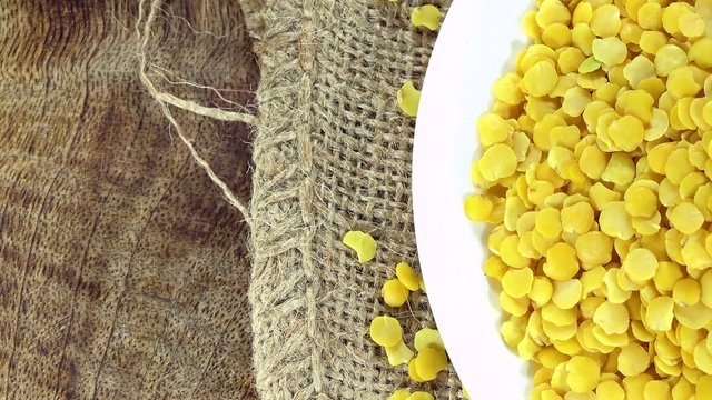 Portion of Yellow Lentils (seamless loopable 4K UHD footage)