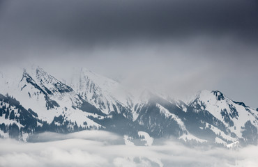 dark clouds in swiss alps in winter
