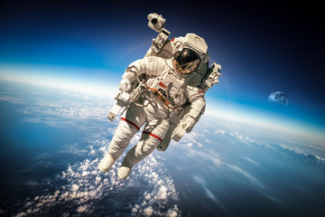 Fototapeta na wymiar Astronaut in outer space