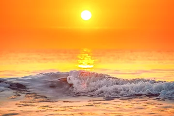 Abwaschbare Fototapete Meer / Sonnenuntergang Sonnenaufgang über dem Meer