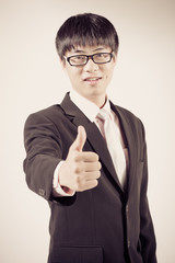 Successful young business man of Asian, full length portrait iso