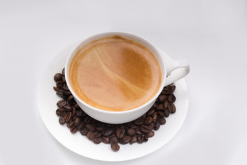 cup of coffee over white background