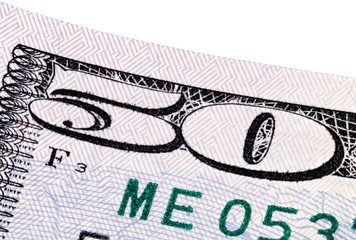 A stack of fifty 50 dollar bills on white background.