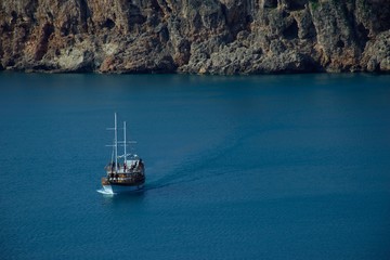 View of Antalya's coastline with tourist ship
