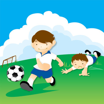 Children playing soccer outdoors