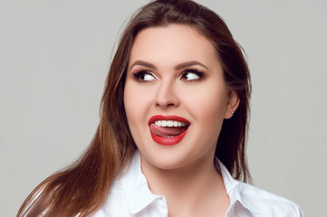Portrait of beautiful plus size curly young woman