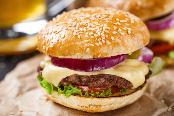 Delicious burger on wooden board