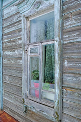 Old wooden window in poor condition