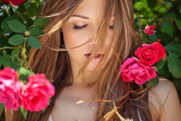 Fototapeta premium beautiful woman in pink flowers