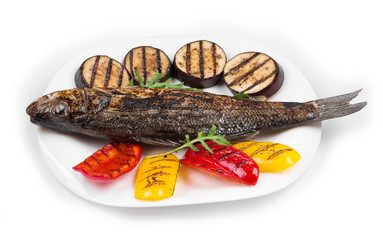 Grilled seabass on plate.
