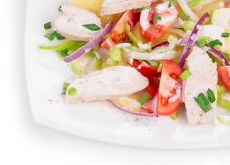 Warm meat salad with vegetables