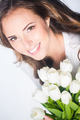 Obraz na płótnie Canvas Woman with pulip flowers