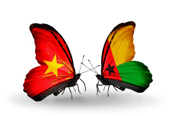 Two butterflies with flags Vietnam and Guinea Bissau