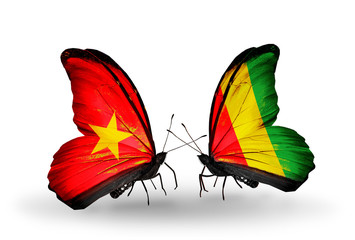 Two butterflies with flags Vietnam and Guinea