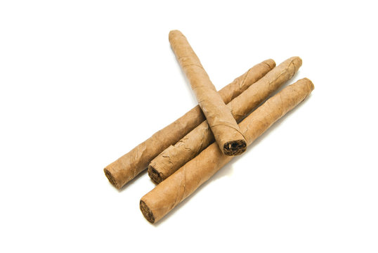 few cuban cigars on white