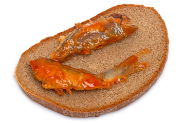 Sprat in tomato sauce on bread