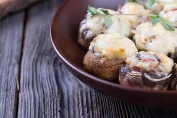Delicious stuffed mushrooms with meat and cheese.