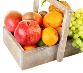 Assortment of fruits in box isolated on white