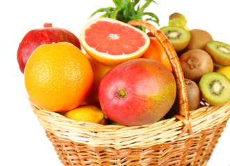 Fototapeta na wymiar Assortment of fruits in basket isolated on white