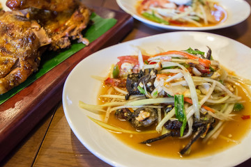 Thai papaya salad serve with vegetables