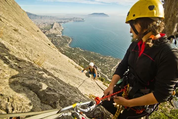 Foto op Aluminium rock climbers ascend the mountain © sergeyonas