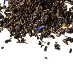 Dried Tea leaves isolated on a white background close up.