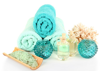 Obraz na płótnie Canvas Spa composition with towels and sea salt isolated on white