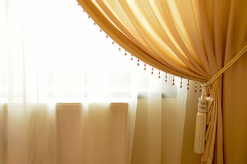 Beige window curtain with crystals