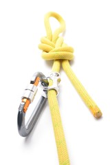 Climbing ascender, rope, carabiner, knot isolated on white.