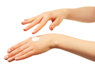 Woman caring hands with cream isolated on white