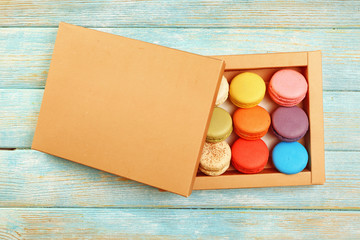 Tasty colorful macaroons in carton box