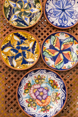 Close up view of beautiful hand painted dishes on a store.