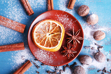 Cinnamon sticks, dried orange, star anise, nutmeg and cloves