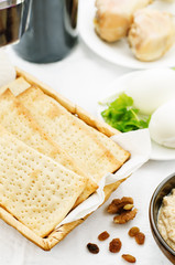 Matzah, wine, eggs, chicken, greens and haroset